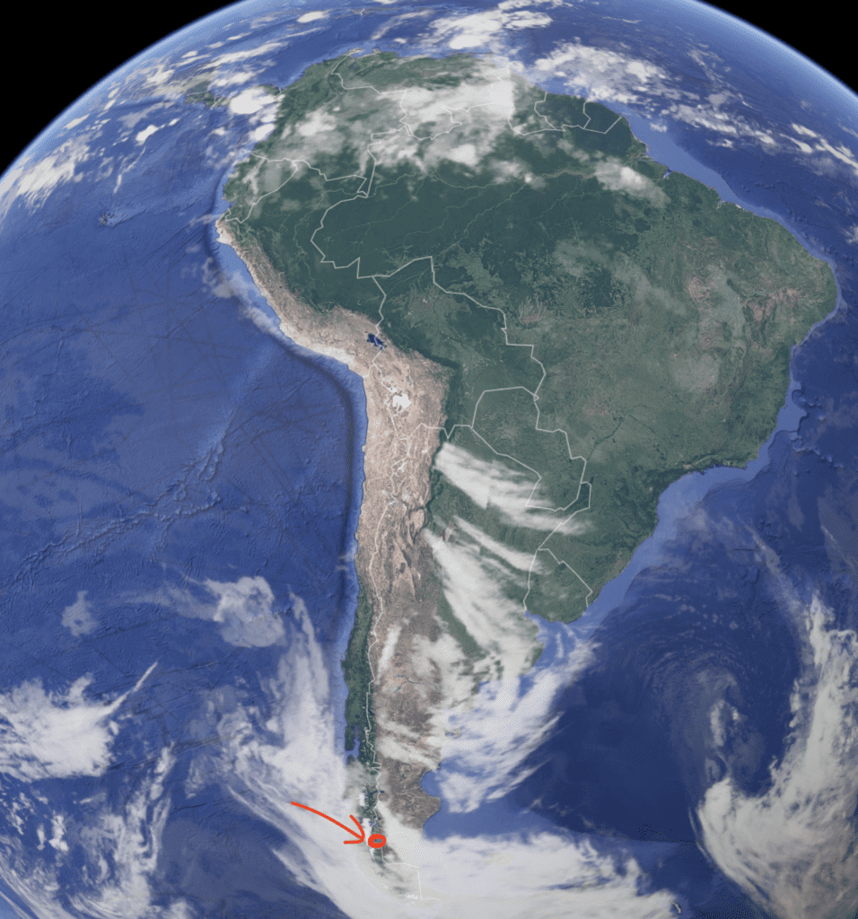 satellite view of south america, red arrow pointing to red circle near the bottom, where el calafate is located